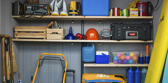 organized shed shelves with items