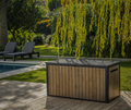 Image showing two friends looking at one mobile on a Keter  Eden Storage Bench