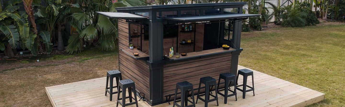 bar shed with chairs in backyard