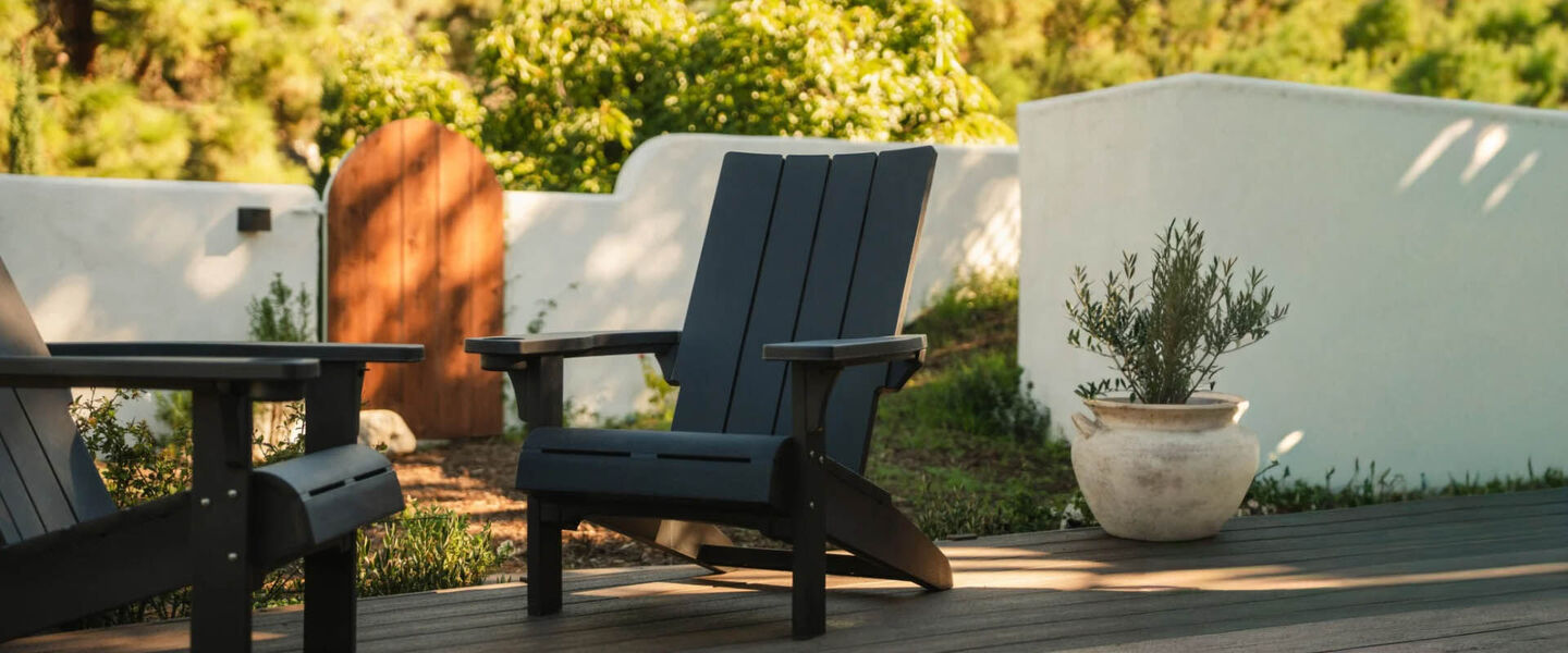 2 keter adirondack chairs in backyard