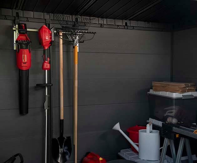 Wall mount tool organizer in a shed