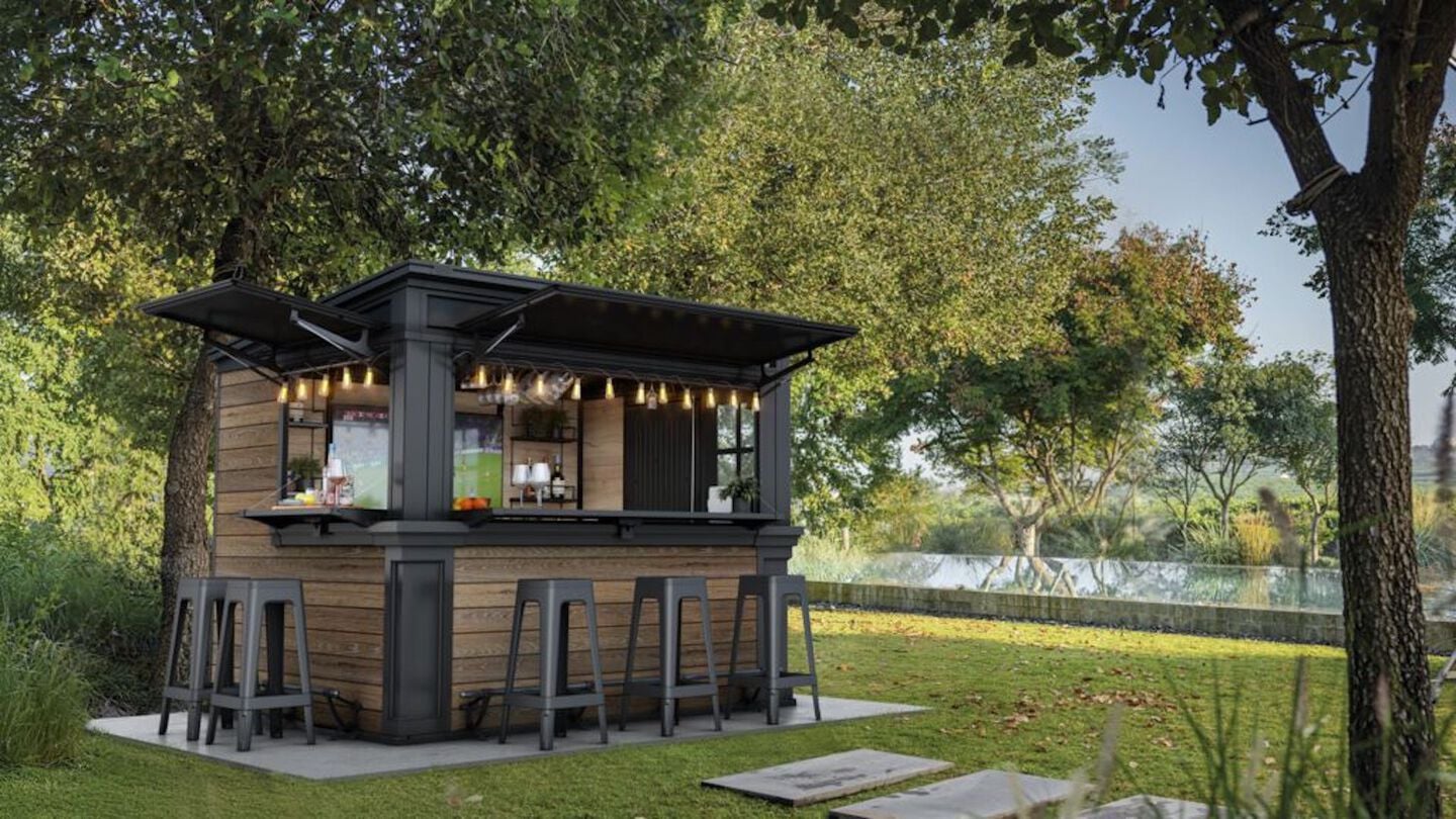 Walnut brown outdoor bard shed in backyard