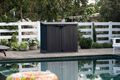 Store-it-out Prime storage shed by the pool