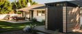 Keter signature shed in the backyard of a home