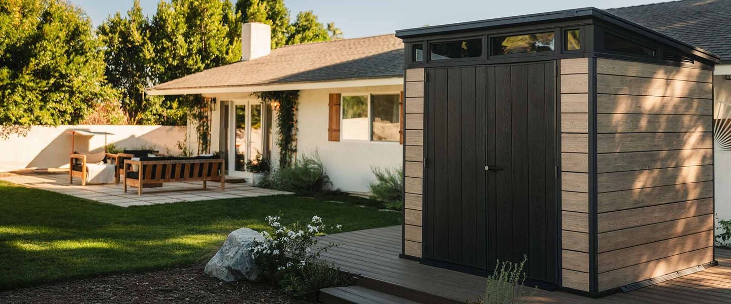 Keter signature shed in the backyard of a home