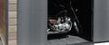 introducing a motorcycle inside a shed
