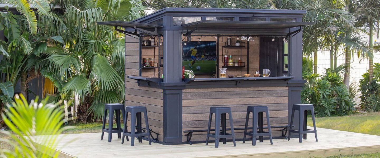 keter outdoor bar shed in backyard