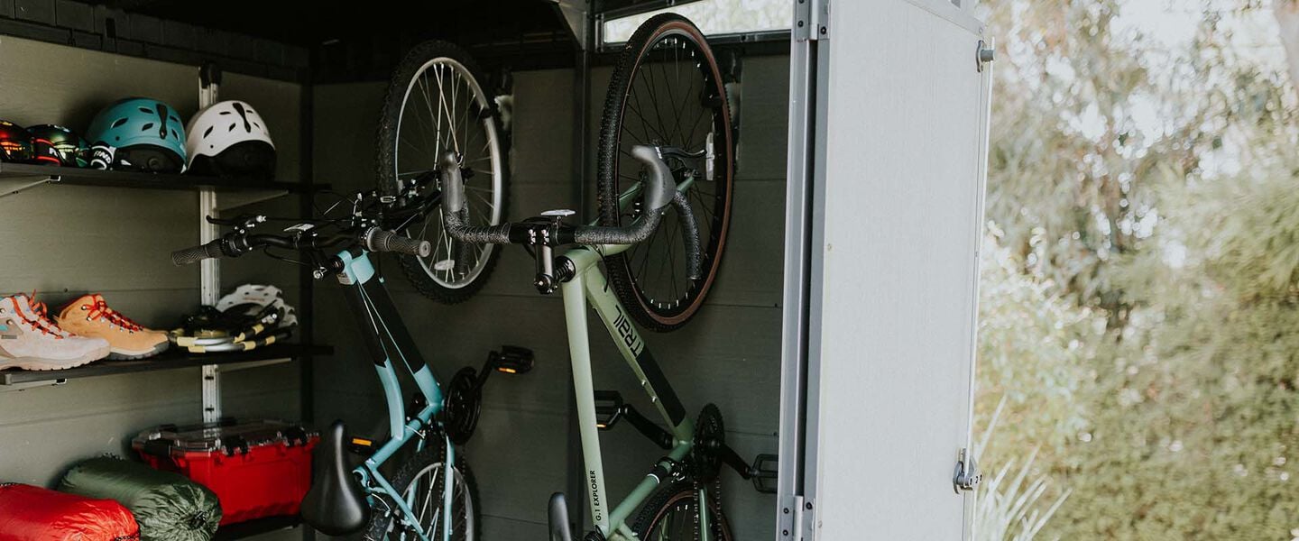 Organized shelves and hanging bikes in a shed