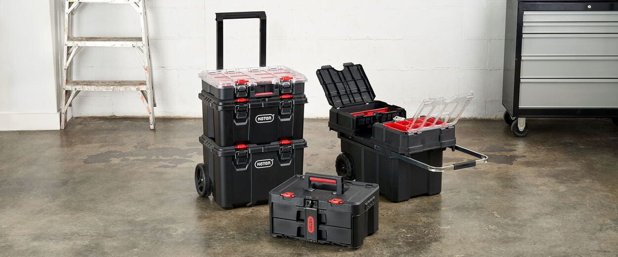 Garage with 3 keter portable tool boxes