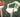 White keter monobloc chair in backyard