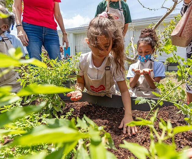 girl planting flowers
