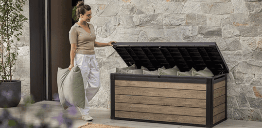 woman opening a deck box