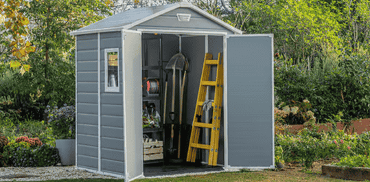 manor garden shed with opened doors and items inside