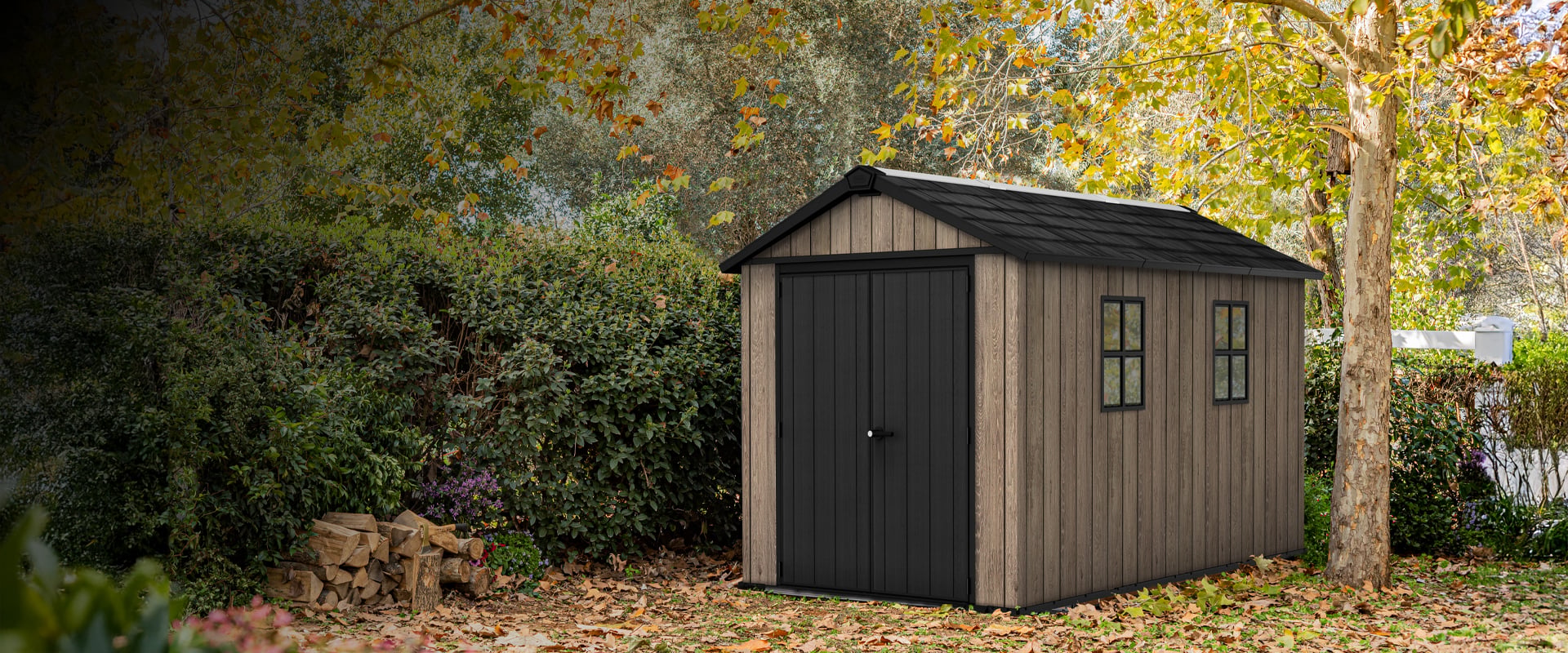 Keter Ashwood 7.5x11ft shed in Autumnal garden
