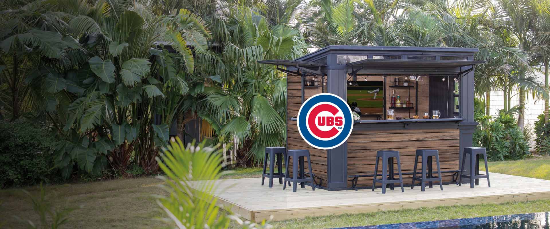 keter outdoor bar shed in backyard with Chicago cubs baseball logo